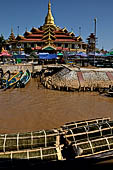 Inle Lake Myanmar. Phaung Daw Oo Paya. Enshrined in the pagoda are five small ancient Buddha images that have been transformed into amorphous blobs by the sheer volume of gold leaf applied by devotees.  